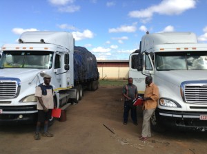 Trucks loaded with soya cake for export from Malawi, 2014 (Source: B. Edelman)